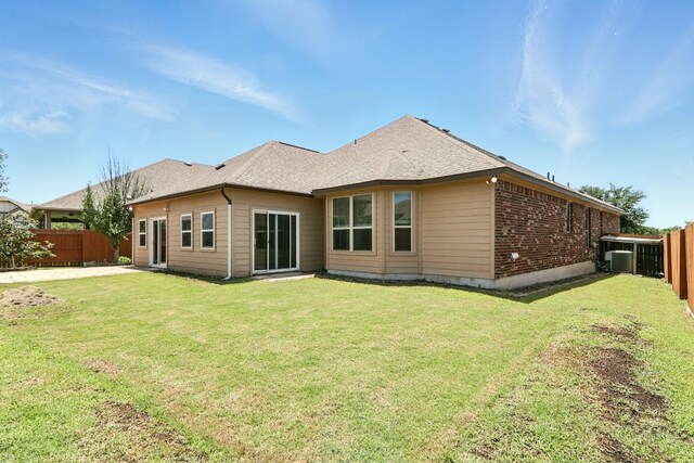 2516 Silver Fern Ln, Pflugerville, TX 78660 - back of house with a fenced backyard and a shingled roof