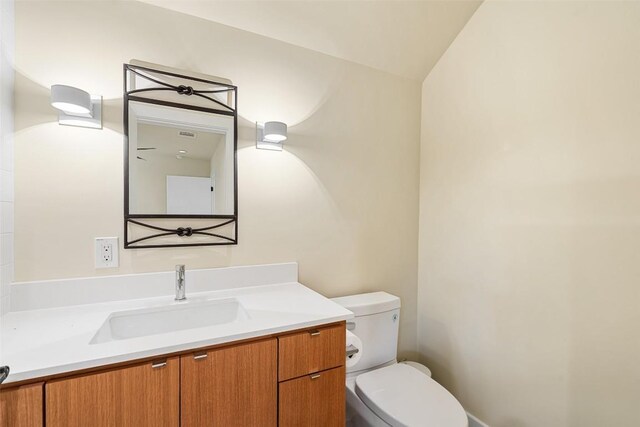 419 Brady Ln, Austin, TX 78746 - half bath featuring vanity and vaulted ceiling