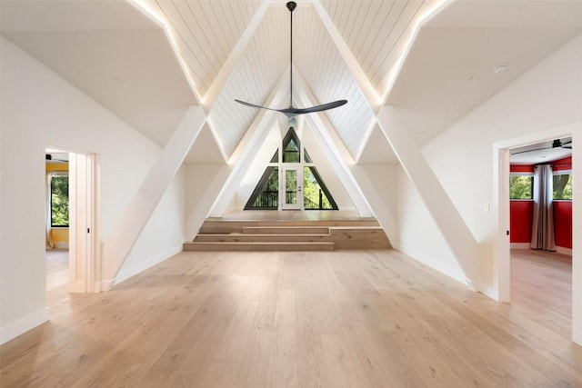 419 Brady Ln, Austin, TX 78746 - bonus room featuring plenty of natural light, wood finished floors, high vaulted ceiling, and a ceiling fan
