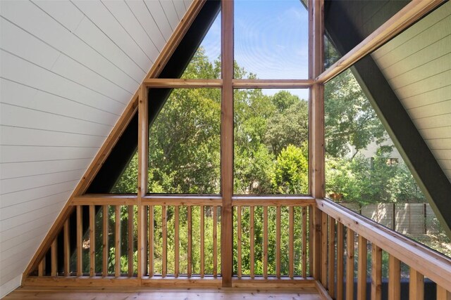 419 Brady Ln, Austin, TX 78746 - unfurnished sunroom with lofted ceiling and plenty of natural light