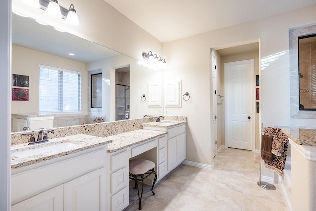 128 Lady Bird Ln, Georgetown, TX 78628 - bathroom with double vanity, tiled shower, and a tub