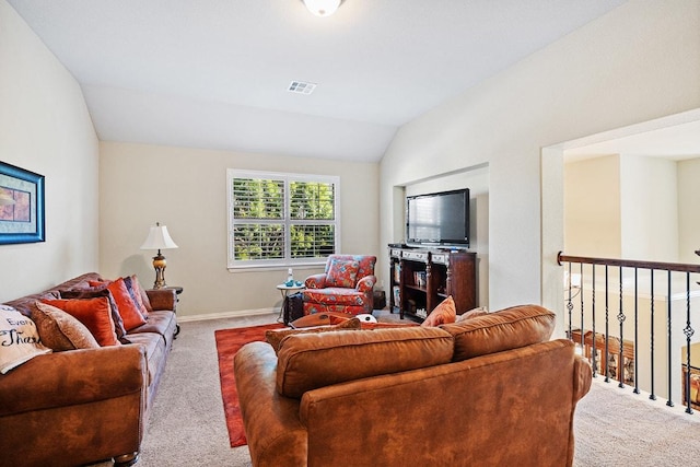 128 Lady Bird Ln, Georgetown, TX 78628 - living room featuring carpet floors and lofted ceiling
