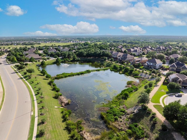 128 Lady Bird Ln, Georgetown, TX 78628 - aerial view of residential area with a large body of water