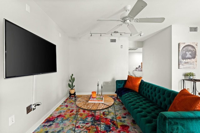 living area with rail lighting and ceiling fan