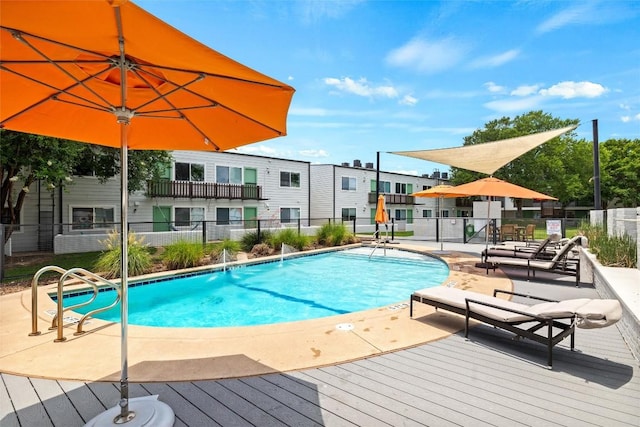 community pool featuring a patio area