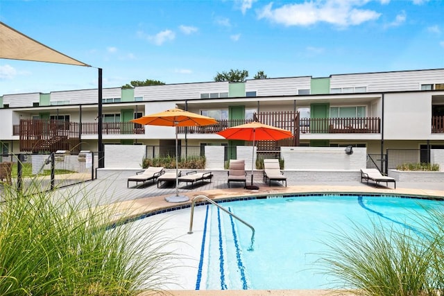 community pool with a patio