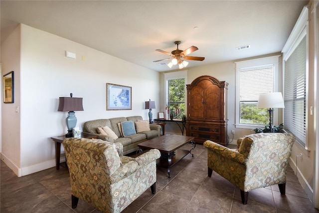 17800 Edgewood Way Unit 203, Jonestown, TX 78645 - living area featuring ceiling fan and dark tile patterned flooring