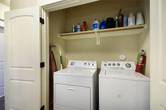 17800 Edgewood Way Unit 203, Jonestown, TX 78645 - laundry area with washing machine and clothes dryer