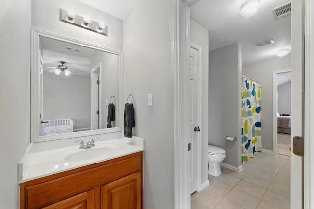 909 Rochester Castle Way, Pflugerville, TX 78660 - ensuite bathroom with tile patterned flooring, vanity, and ceiling fan