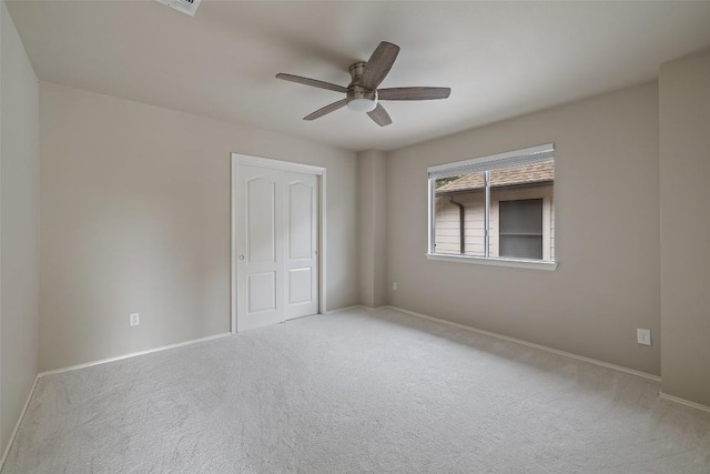 4604 Hibiscus Valley Dr, Austin, TX 78739 - unfurnished bedroom featuring carpet, a ceiling fan, and a closet
