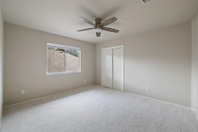 4604 Hibiscus Valley Dr, Austin, TX 78739 - unfurnished bedroom featuring light colored carpet, a closet, and ceiling fan