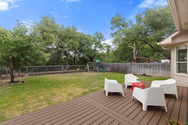 4604 Hibiscus Valley Dr, Austin, TX 78739 - deck with a playground, a fenced backyard, and view of scattered trees