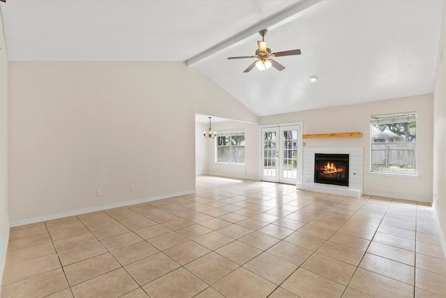 9400 Canus Dr, Austin, TX 78748 - unfurnished living room featuring light tile patterned floors, healthy amount of natural light, a fireplace, and ceiling fan