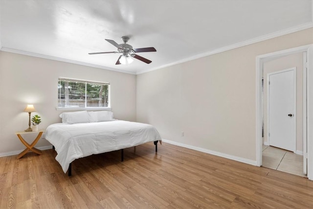 9400 Canus Dr, Austin, TX 78748 - bedroom featuring light wood-style floors, ornamental molding, and a ceiling fan
