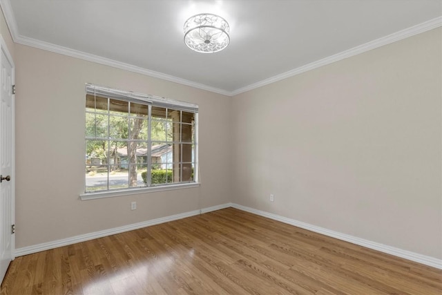 9400 Canus Dr, Austin, TX 78748 - spare room featuring wood finished floors and ornamental molding