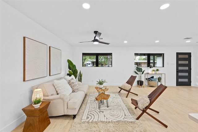 1305 Ridgehaven Dr, Austin, TX 78723 - living room with recessed lighting, light wood-style floors, and ceiling fan