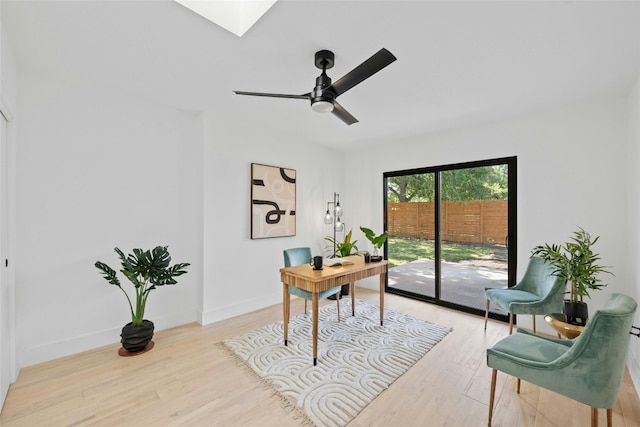 1305 Ridgehaven Dr, Austin, TX 78723 - office area featuring light wood-style flooring, a skylight, and ceiling fan