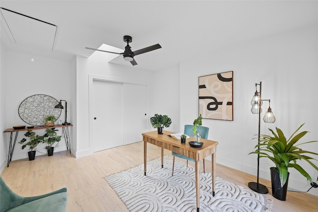 1305 Ridgehaven Dr, Austin, TX 78723 - home office featuring attic access, ceiling fan, and light wood finished floors