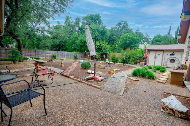 205 Mesa Verde St, Cedar Park, TX 78613 - fenced backyard with a patio area
