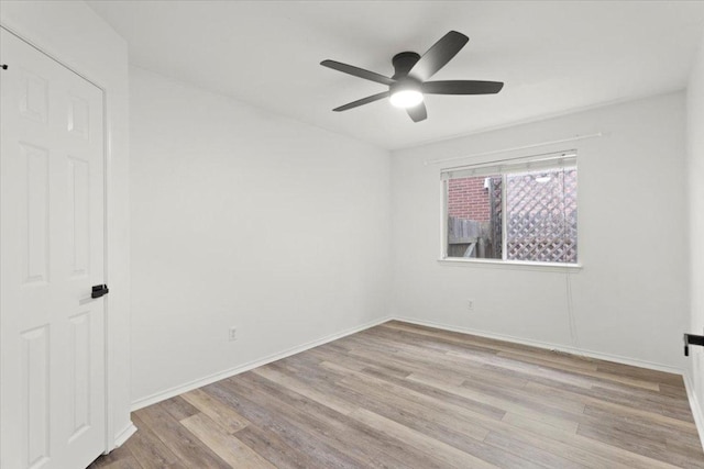 1522 Tamar Ln, Austin, TX 78727 - unfurnished bedroom featuring wood finished floors and ceiling fan