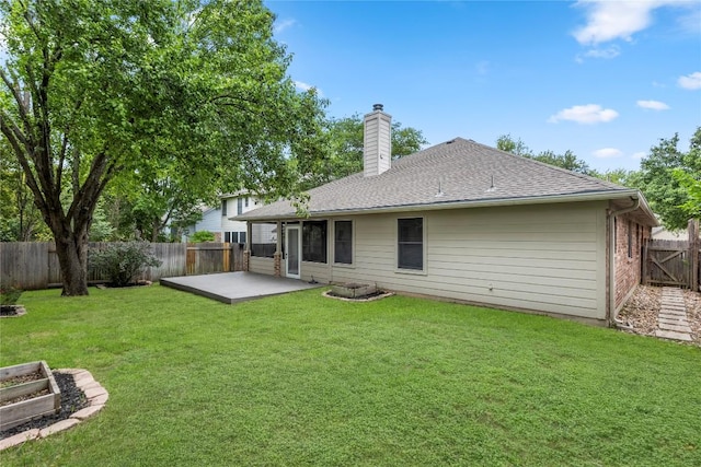 1522 Tamar Ln, Austin, TX 78727 - back of house featuring a chimney, a fenced backyard, a patio area, and roof with shingles