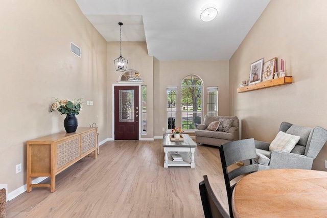 1401 Jackie Robinson Pl, Round Rock, TX 78665 - living room with light wood-style floors and baseboards