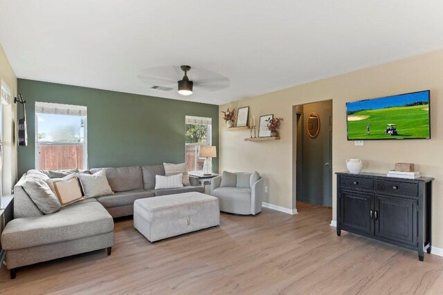 1401 Jackie Robinson Pl, Round Rock, TX 78665 - living room featuring light wood-style flooring and ceiling fan
