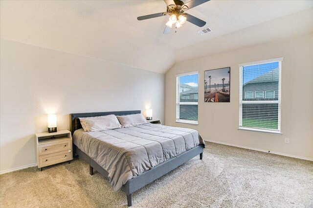 100 Rebel Red Cv, Liberty Hill, TX 78642 - bedroom featuring light carpet, vaulted ceiling, and ceiling fan
