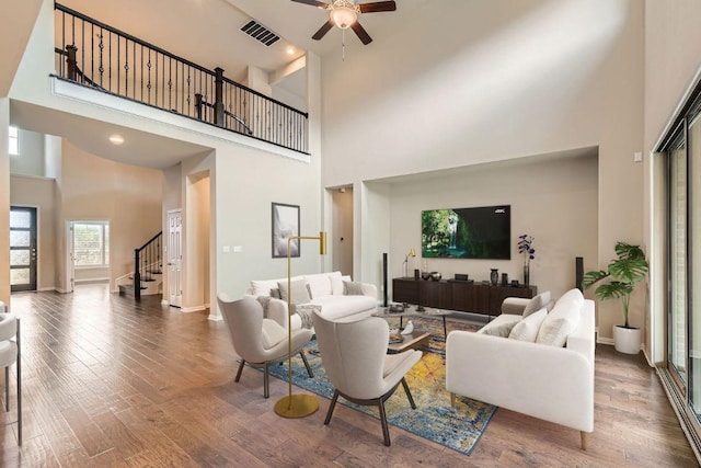 12383 Mesa Verde Dr, Austin, TX 78737 - living area with a high ceiling, stairway, wood finished floors, and ceiling fan