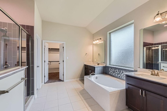 12383 Mesa Verde Dr, Austin, TX 78737 - full bath featuring a shower stall, two vanities, a garden tub, vaulted ceiling, and a spacious closet