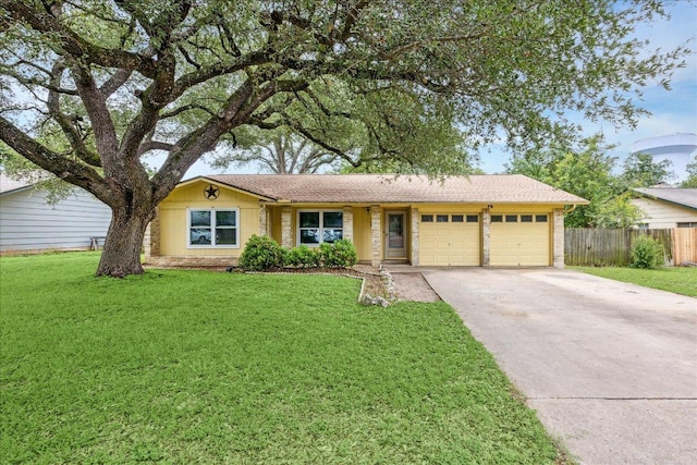 9613 Newberry Dr, Austin, TX 78729 - ranch-style house featuring a garage and concrete driveway