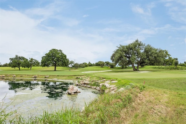 232 Cimarron Hills Trl E, Georgetown, TX 78628 - surrounding community with a lawn and golf course view