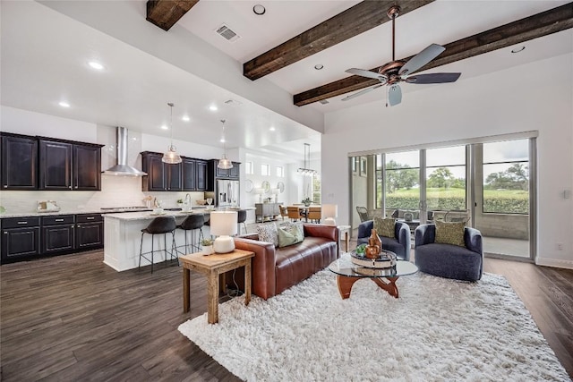232 Cimarron Hills Trl E, Georgetown, TX 78628 - living room featuring dark wood-style flooring, ceiling fan, recessed lighting, and beam ceiling