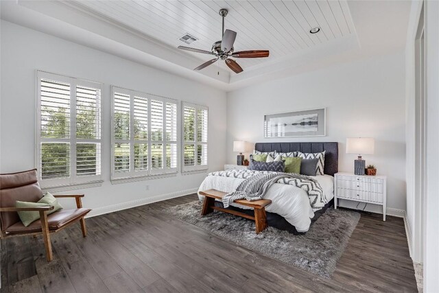 232 Cimarron Hills Trl E, Georgetown, TX 78628 - bedroom featuring a raised ceiling, wood finished floors, wooden ceiling, and a ceiling fan