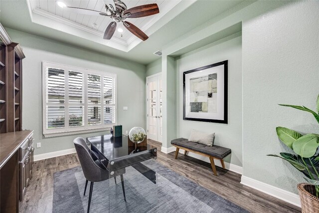 232 Cimarron Hills Trl E, Georgetown, TX 78628 - home office with a raised ceiling, dark wood-type flooring, ornamental molding, and ceiling fan