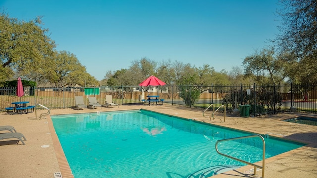 7500 Shadowridge Run Unit 47, Austin, TX 78749 - community pool with a patio