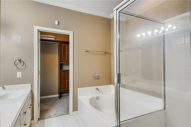 7500 Shadowridge Run Unit 47, Austin, TX 78749 - full bathroom featuring vanity, a garden tub, tile patterned flooring, and an enclosed shower