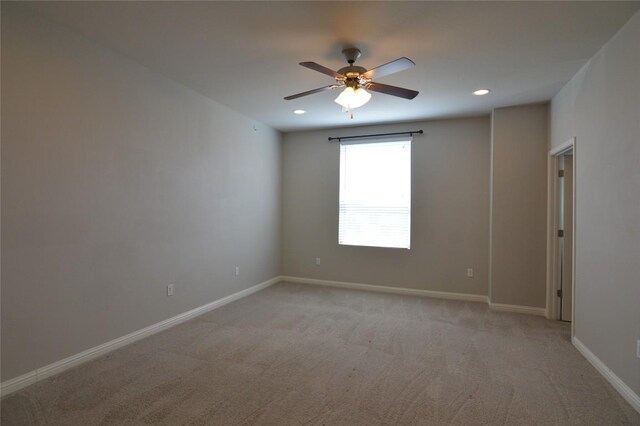 6814 E Riverside Dr Unit 52, Austin, TX 78741 - unfurnished room featuring ceiling fan, light colored carpet, and recessed lighting