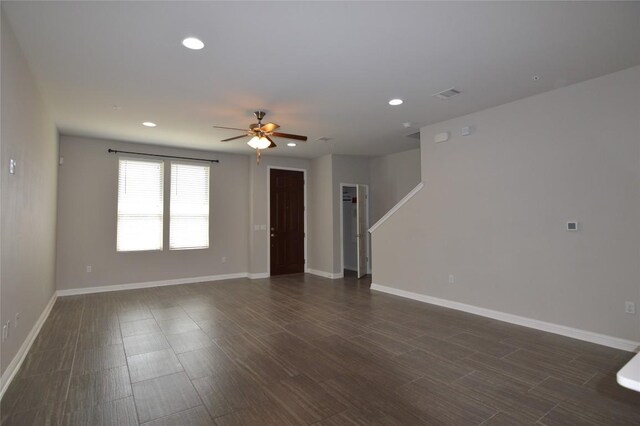 6814 E Riverside Dr Unit 52, Austin, TX 78741 - unfurnished room with a ceiling fan, recessed lighting, and dark wood-type flooring