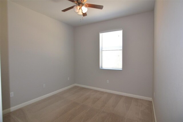 6814 E Riverside Dr Unit 52, Austin, TX 78741 - spare room with light carpet and ceiling fan