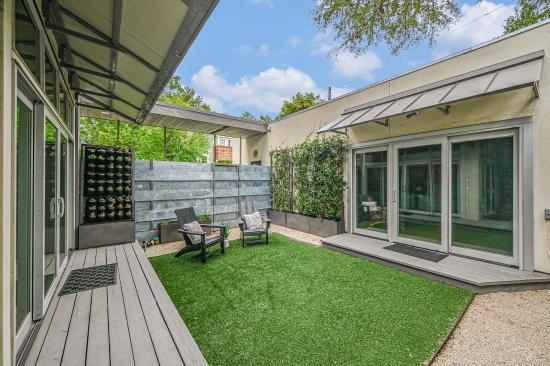 2822 Wooldridge Dr Unit B, Austin, TX 78703 - view of yard featuring a deck
