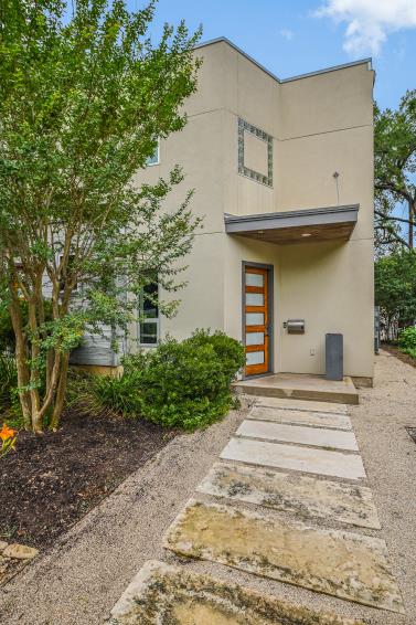 2822 Wooldridge Dr Unit B, Austin, TX 78703 - view of exterior entry with stucco siding