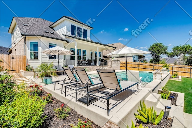351 Kings Pine Dr, Dripping Springs, TX 78620 - back of house featuring a fenced backyard, a patio area, and a shingled roof