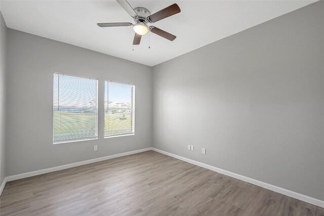 12166 Metric Blvd Unit 2011, Austin, TX 78758 - unfurnished room with wood finished floors and a ceiling fan