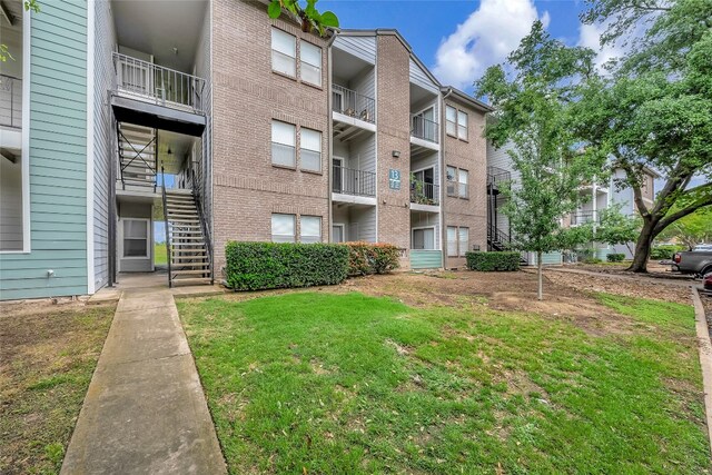 12166 Metric Blvd Unit 2011, Austin, TX 78758 - view of apartment building / complex featuring stairs