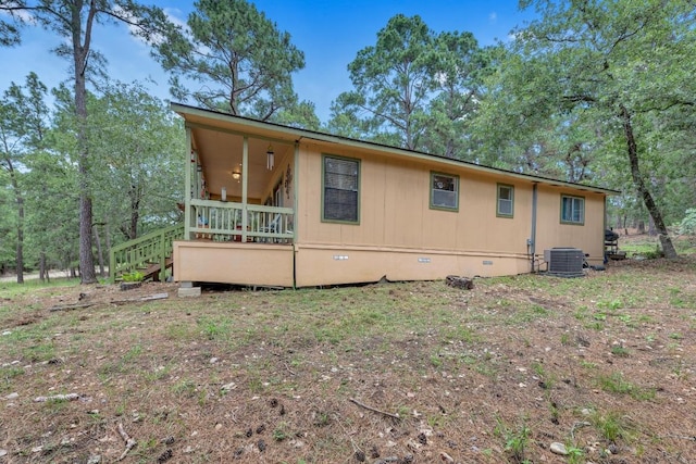 928 Moccasin Trl, La Grange, TX 78945 - view of home's exterior with crawl space and a wooden deck