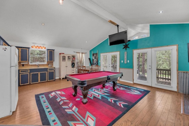928 Moccasin Trl, La Grange, TX 78945 - game room featuring french doors, light wood-style floors, billiards, and wainscoting