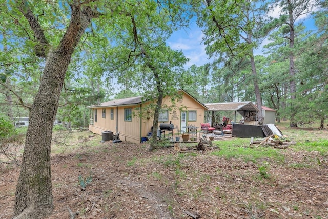 928 Moccasin Trl, La Grange, TX 78945 - back of property with a patio area