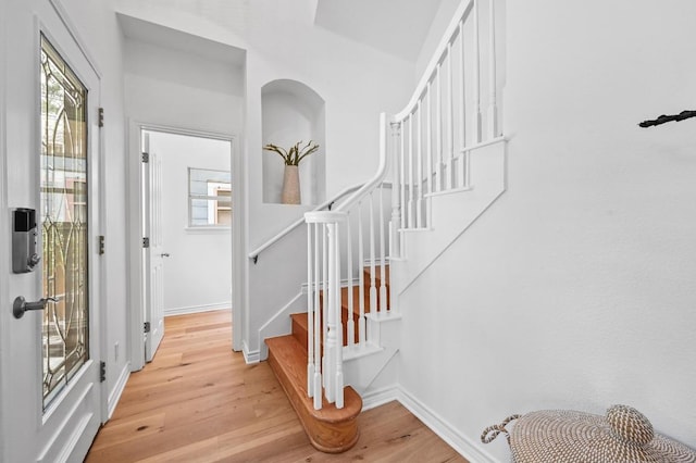 803 Jessie St, Austin, TX 78704 - foyer featuring light wood-type flooring and stairs