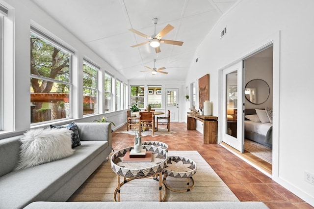 803 Jessie St, Austin, TX 78704 - sunroom featuring healthy amount of natural light, tile patterned floors, french doors, and vaulted ceiling